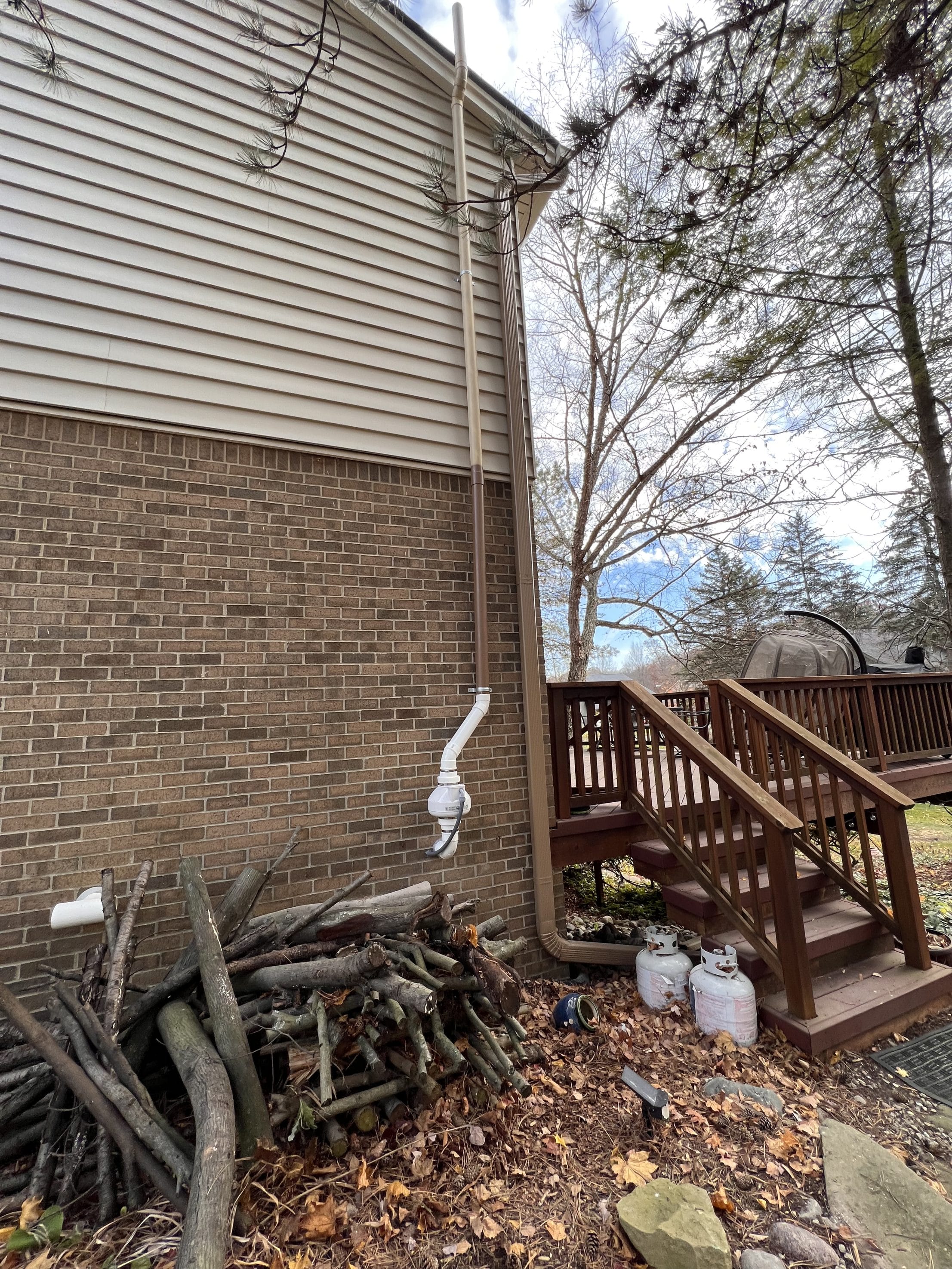 Radon Mitigation System Installation in Indianapolis Backyard
