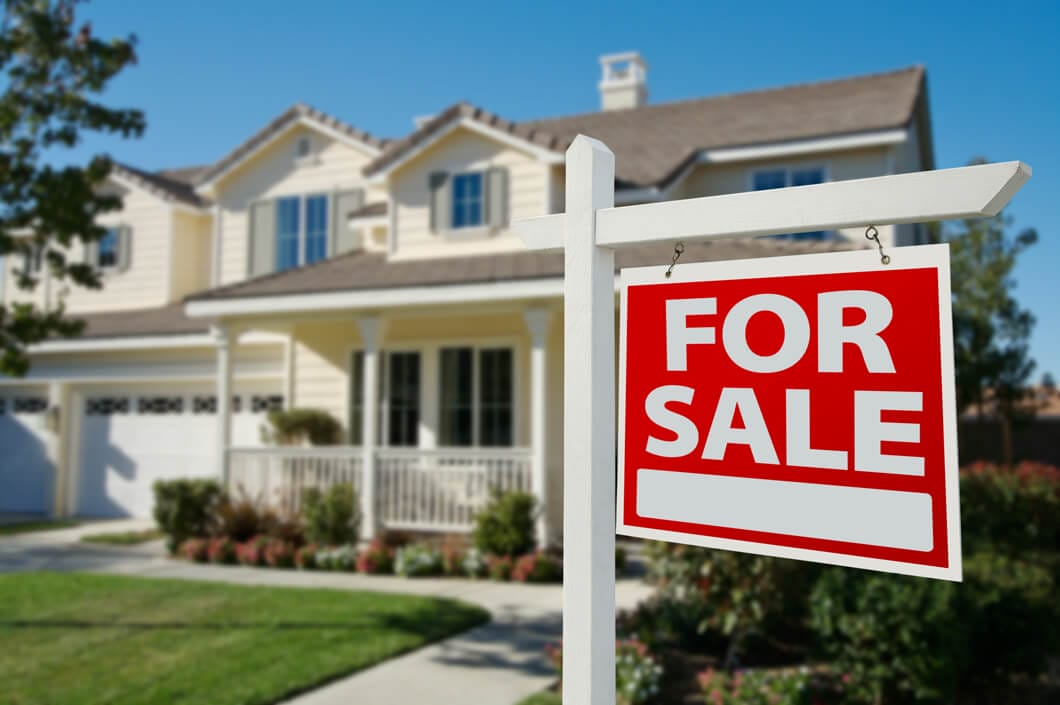 House for Sale Sign Associated with Radon Services
